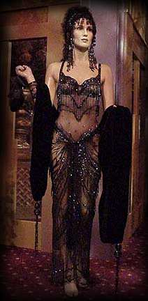 Cher in revealing black beaded gown