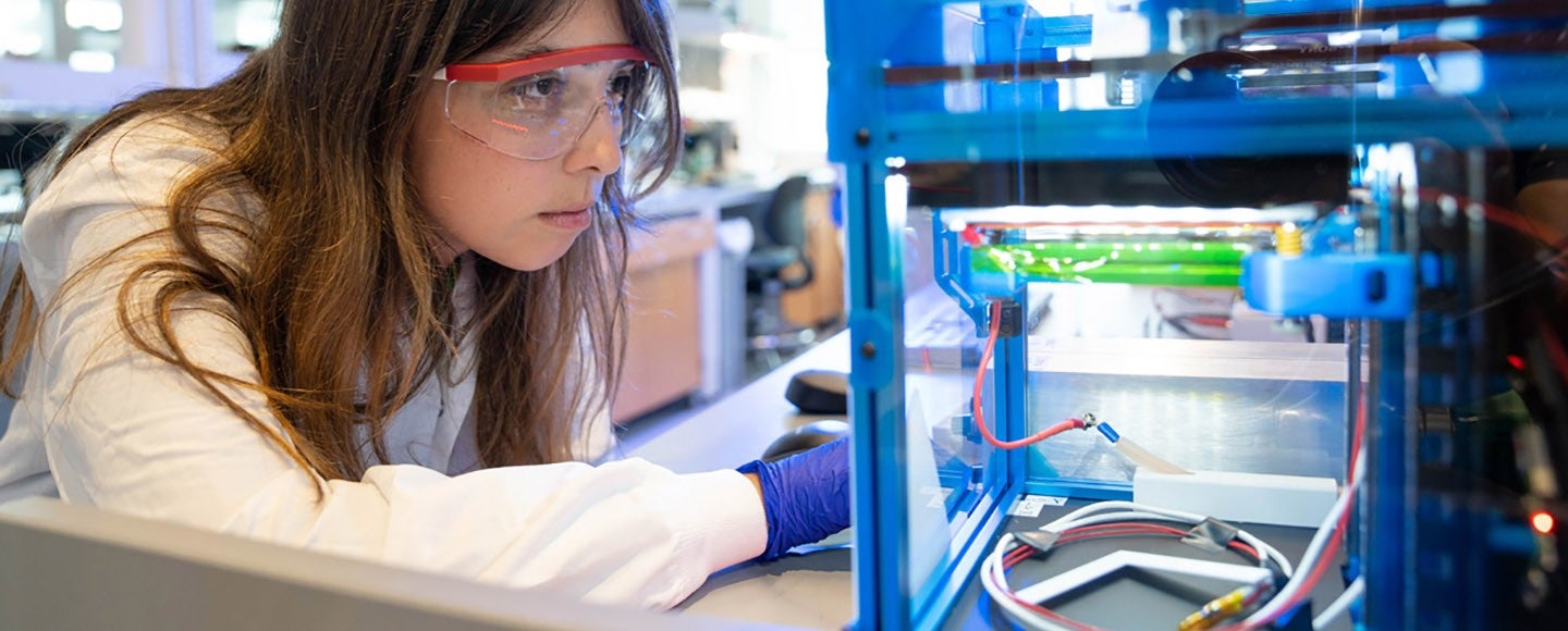 Student working with lab equipment in the Dalton Lab