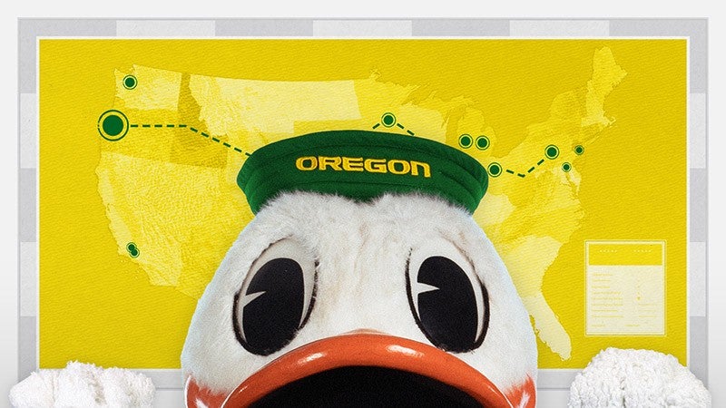 the UO Duck mascot peeks into the frame with a map in the background