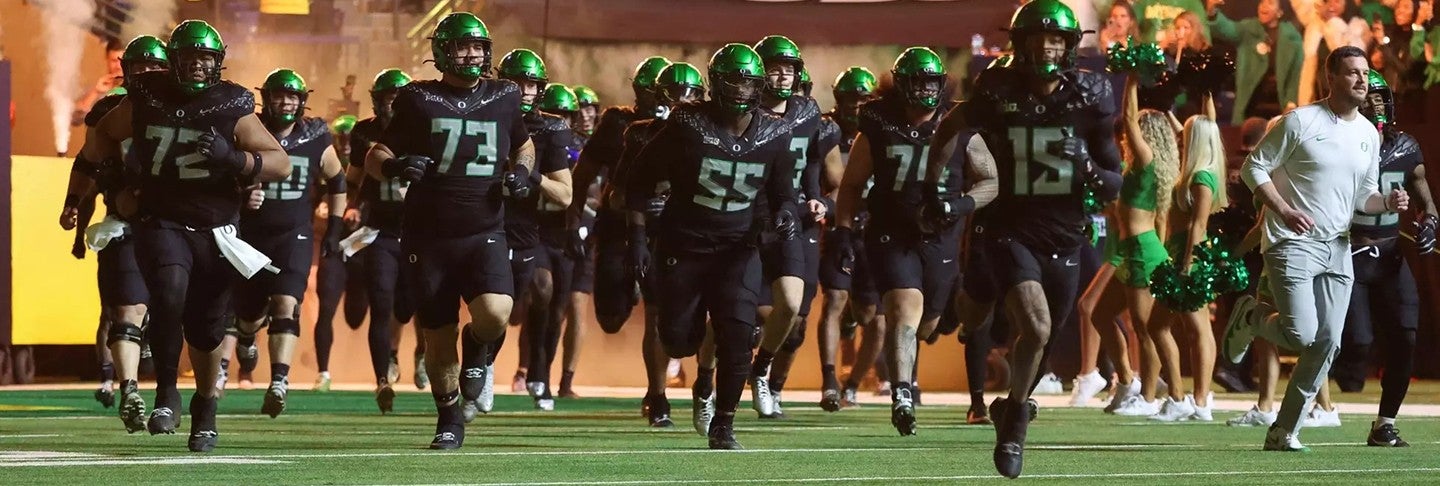 Oregon football team running out onto the field