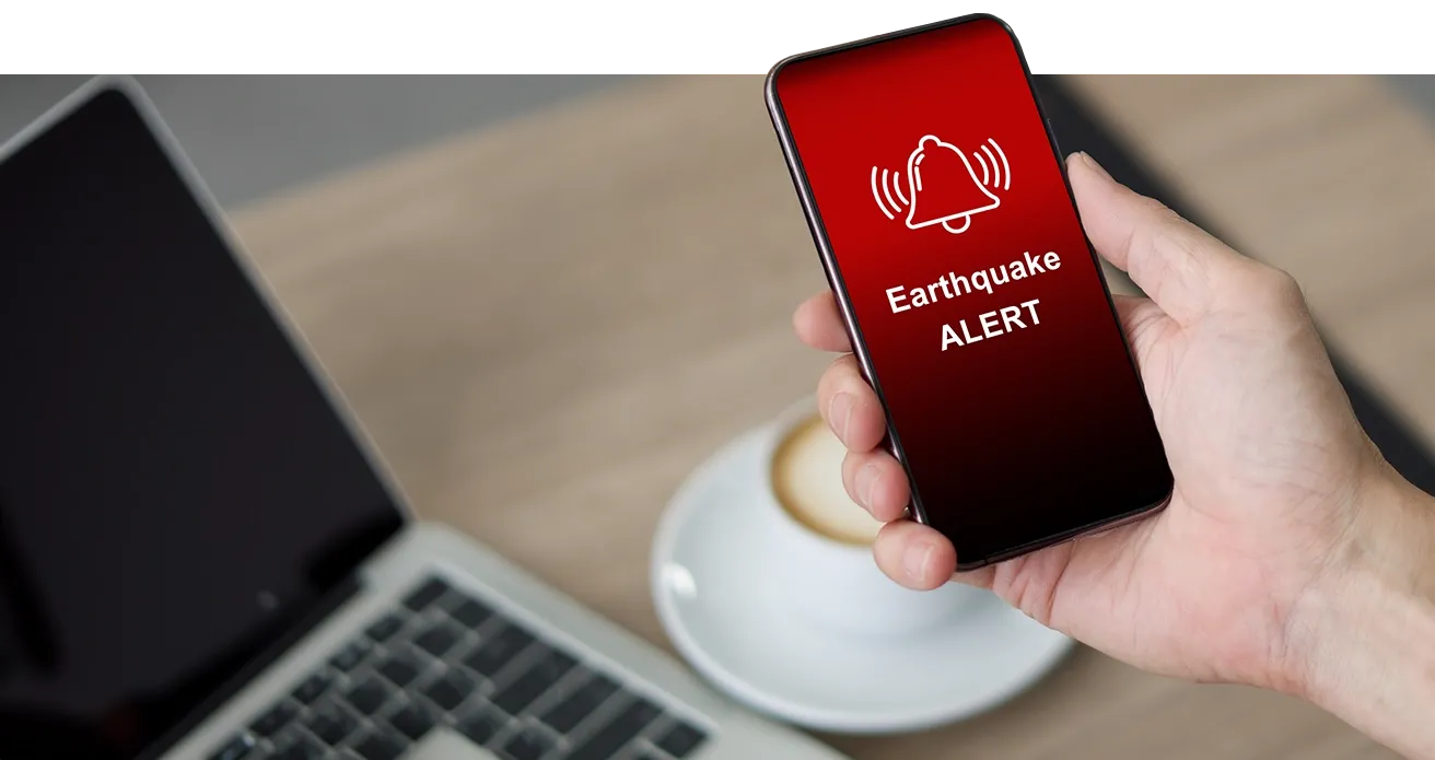 Cell phone displaying earthquake alert