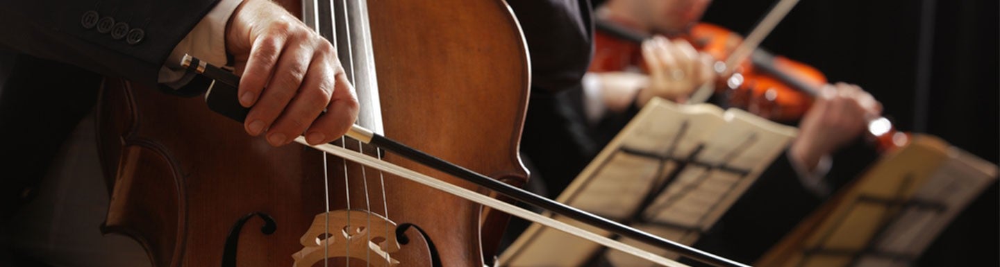 Hands playing a cello