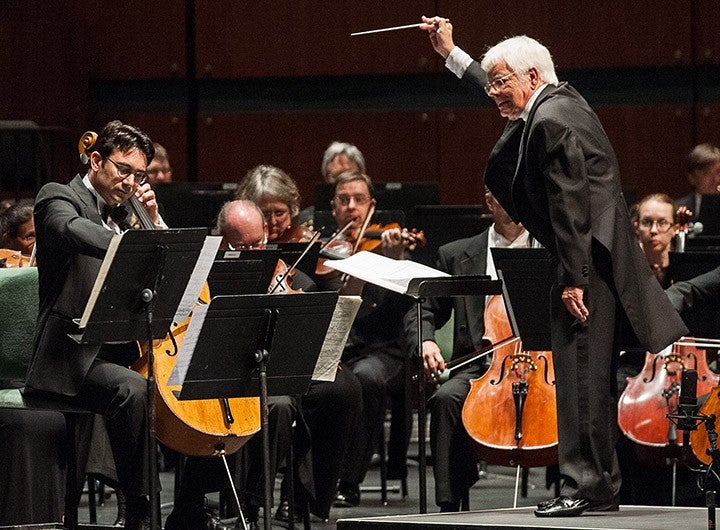 Conductor and an orchestra Conductor and an orchestra